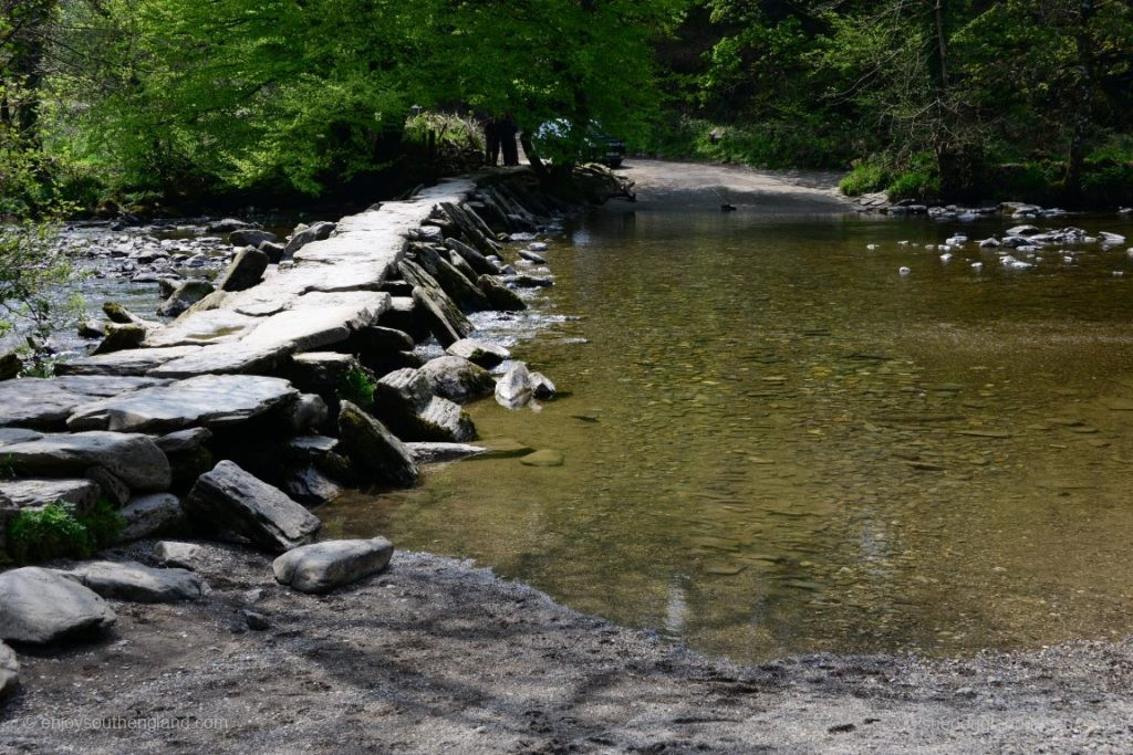 The Tarr Steps are 55m long and consist of 17 gritstone slabs that lie loosely on pillars about a metre above the water.