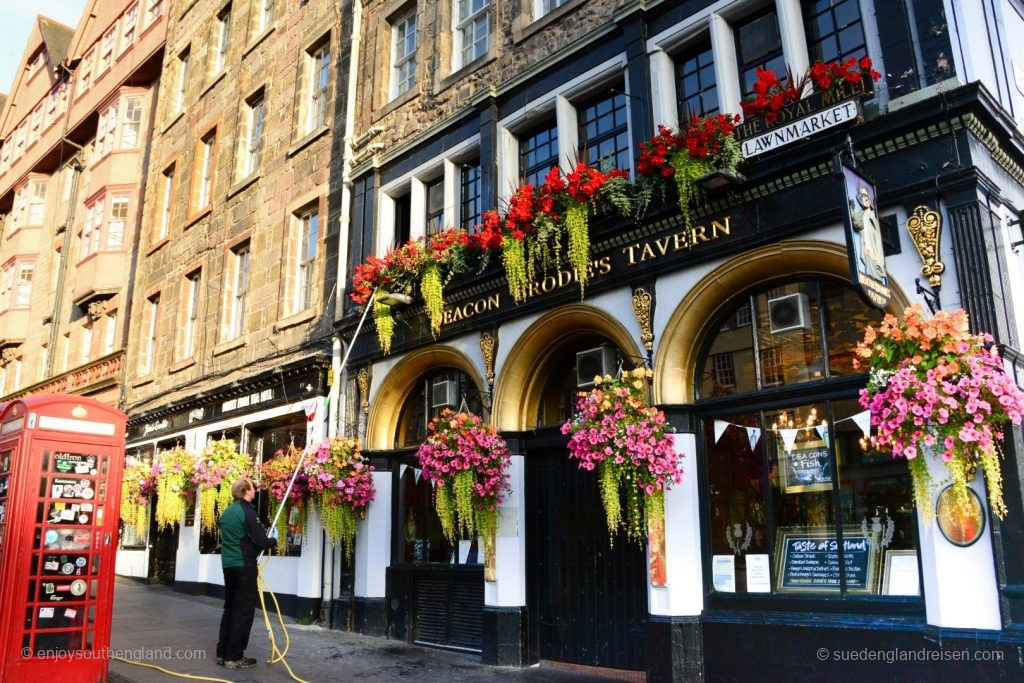 Morning in Edinburgh Old Town – the flowers are being watered.