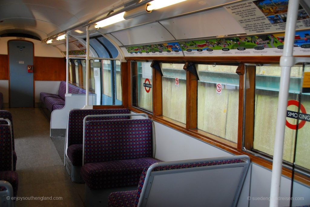 IOW Island Line -Interior view of one of the subway carriages - note the drawn description of the route with stops and points of interest attached above the windows.