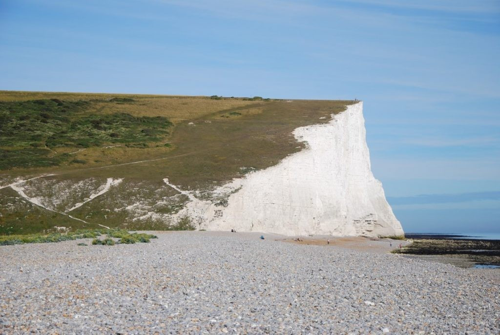 The impressive white chalk cliffs of the Seven Sisters (East Sussex) seen from the beach
