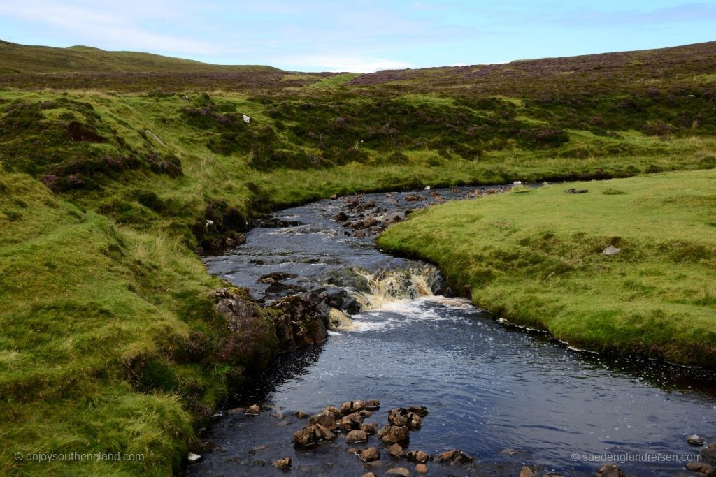Moorland, repeatedly interrupted by rivers with peaty water